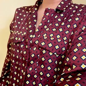 Red satin printed blouse.